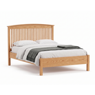 Oak Shaker style bed frame with arched spindle headboard