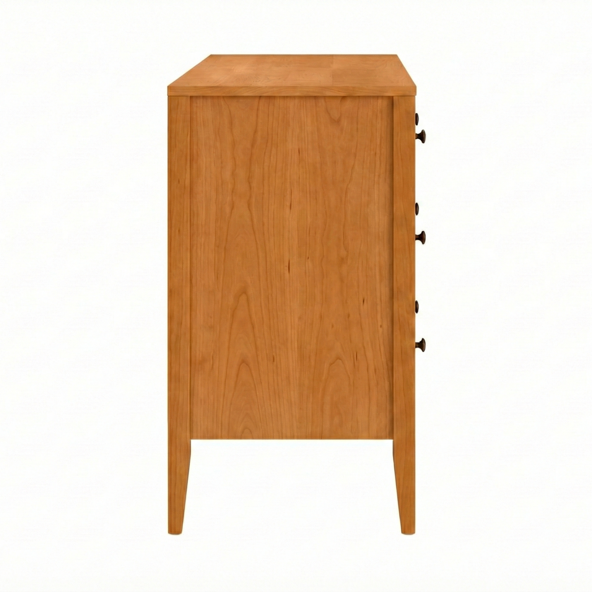 Side view of a natural Vermont cherry wood six-drawer dresser with metal knobs. Built to last a lifetime.