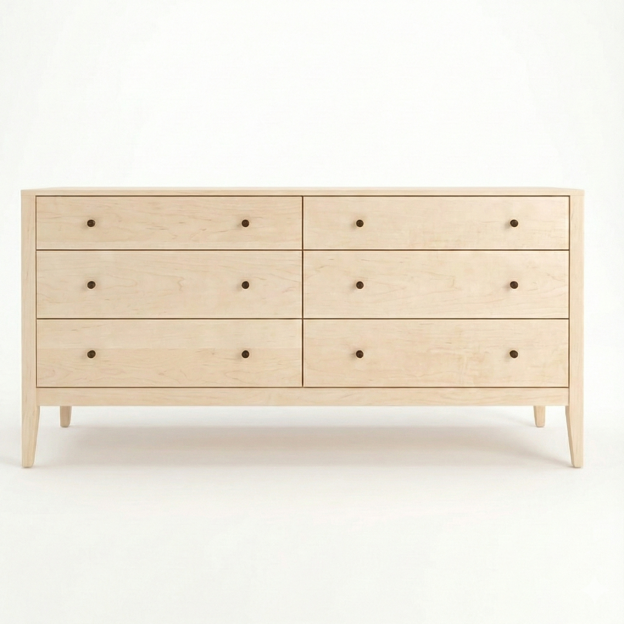 Experience the exceptional quality of authentic Vermont craftsmanship with this six-drawer dresser. Built to last from sustainably sourced solid wood, this piece features durable dovetail joinery and is finished with classic round knobs for a timeless look. Show in Maple Natural Wood with black knobs.