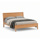 Modern solid oak wood panel bed with low footboard