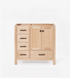 A light natural maple wood bathroom vanity cabinet with four drawers on the left, two doors with black round knobs on the right, and a recessed top surface, shown on a clean white background.